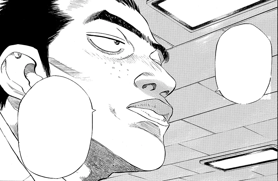 Manga panel: a heavy-browed doctor looking down his nose, between two speech balloons.
